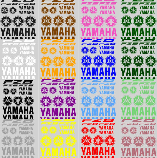Collection of Yamaha logos and branding in various colors on a gray background