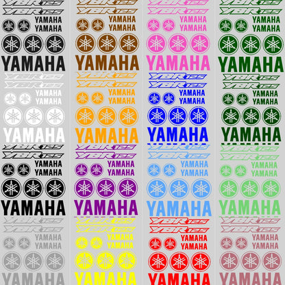 Collection of Yamaha logos and text in various colors on a gray background